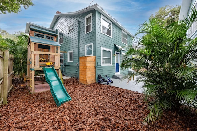 6619 Livingston Ave N, Saint Petersburg, FL 33702 - view of playground featuring fence