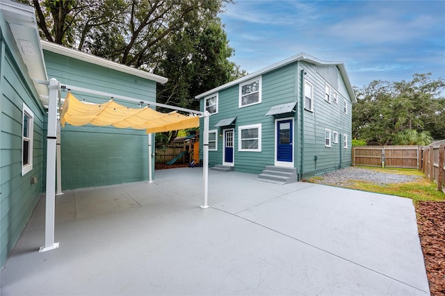 6619 Livingston Ave N, Saint Petersburg, FL 33702 - exterior space with a patio, fence, and entry steps