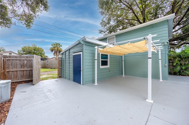 6619 Livingston Ave N, Saint Petersburg, FL 33702 - exterior space with a pergola and fence