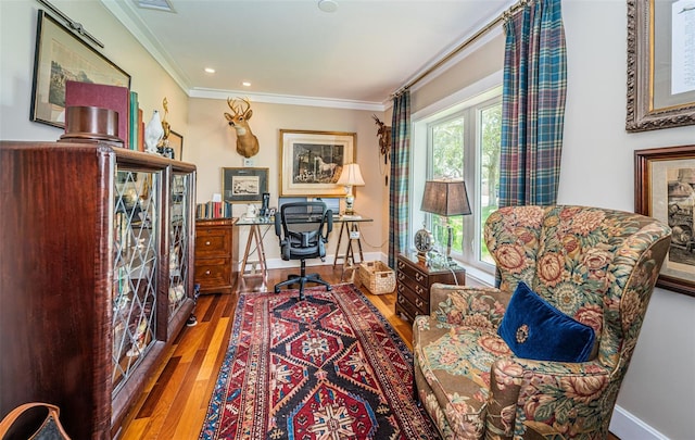 office featuring hardwood / wood-style floors and ornamental molding