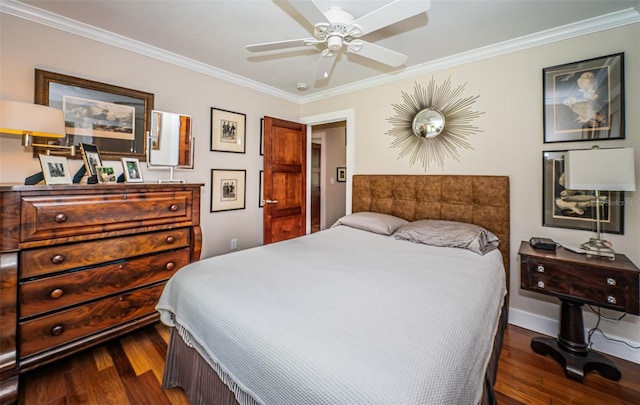 bedroom with ornamental molding, dark hardwood / wood-style flooring, and ceiling fan