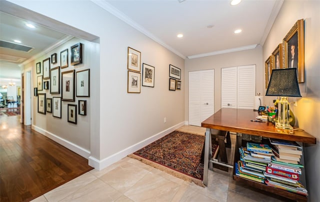 interior space featuring wood-type flooring and ornamental molding