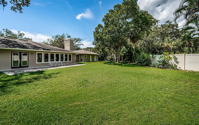 view of yard with a patio area