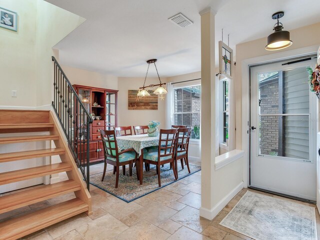 dining space featuring plenty of natural light