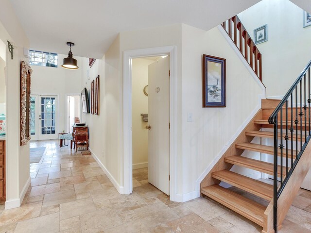 stairway with french doors