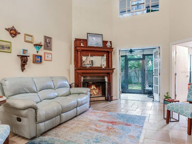 living room featuring a high ceiling