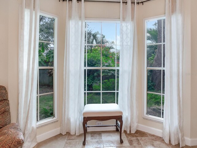 sitting room with a healthy amount of sunlight