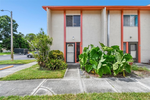 1655 58th Ter S Unit 1, Saint Petersburg, FL 33712 - view of front facade with stucco siding