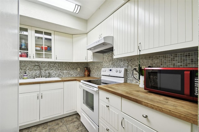 kitchen with white cabinets, backsplash, white electric stove, wood counters, and sink