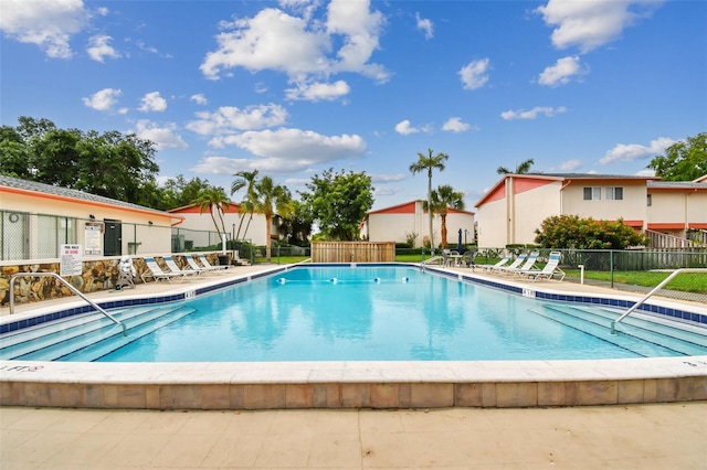 view of swimming pool featuring a patio