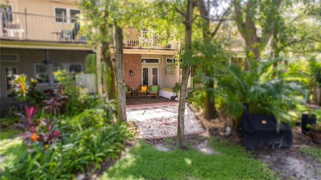 exterior space featuring a balcony