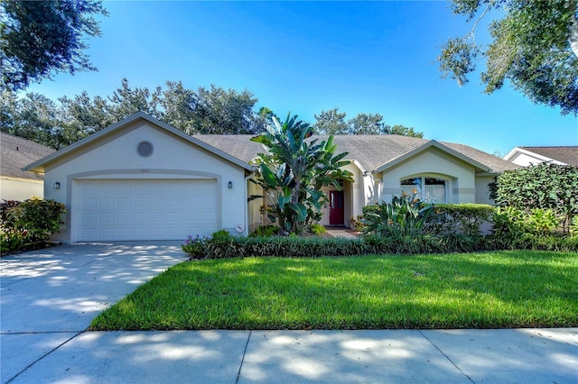 ranch-style house with a front yard and a garage