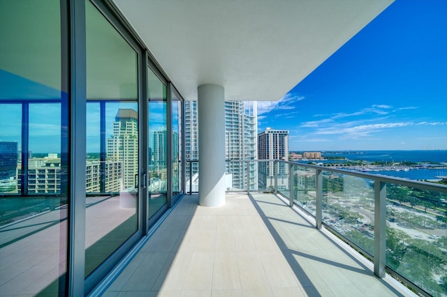 balcony featuring a water view