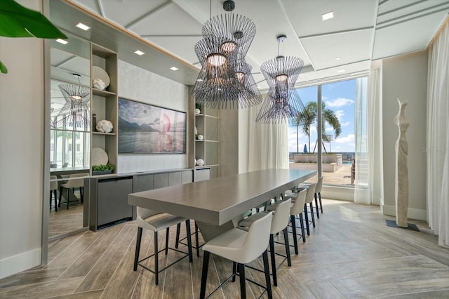 dining space with light wood-type flooring