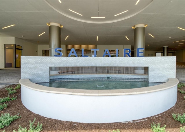 exterior space featuring a hot tub