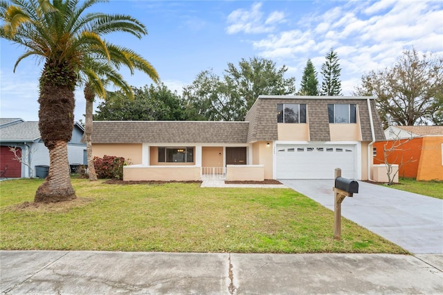 front of property featuring a front yard and a garage