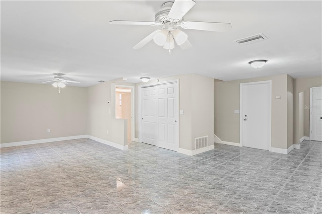 empty room featuring ceiling fan