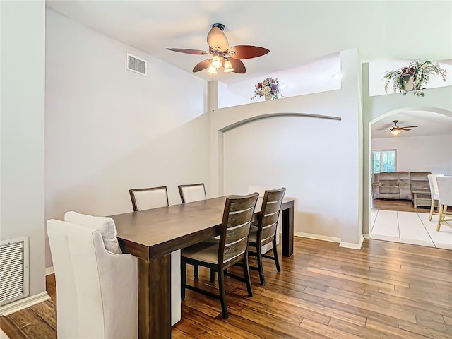 dining room featuring ceiling fan and wood-type flooring