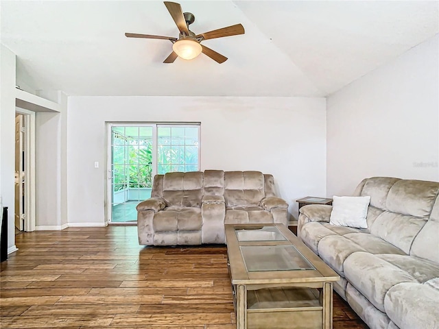 living room featuring lofted ceiling, ceiling fan, and hardwood / wood-style flooring