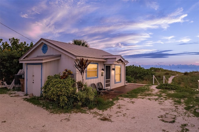 view of property exterior at dusk