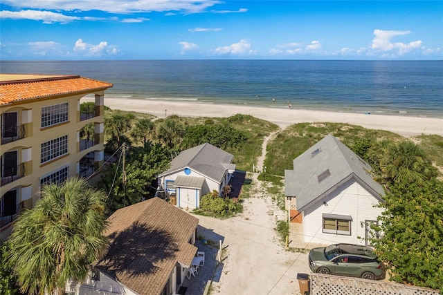 bird's eye view with a beach view and a water view