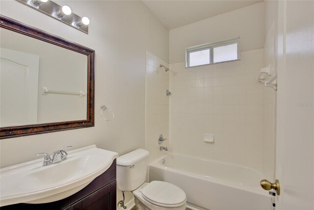 7110 Moss Ledge Run, Land O Lakes, FL 34637 - bathroom with shower / bathing tub combination, toilet, and vanity