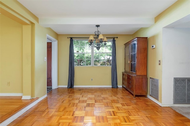 unfurnished dining area with a chandelier and light parquet flooring