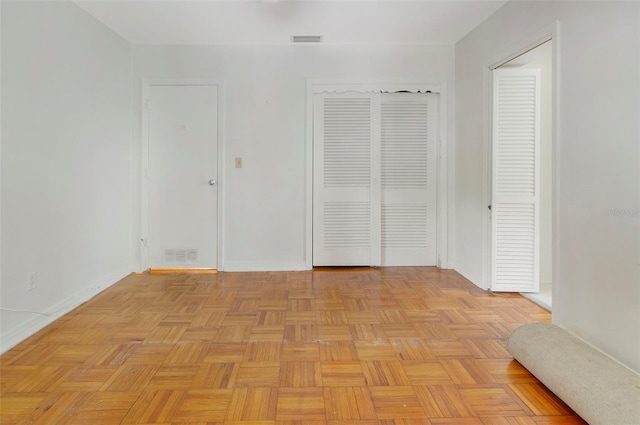 interior space with light parquet floors