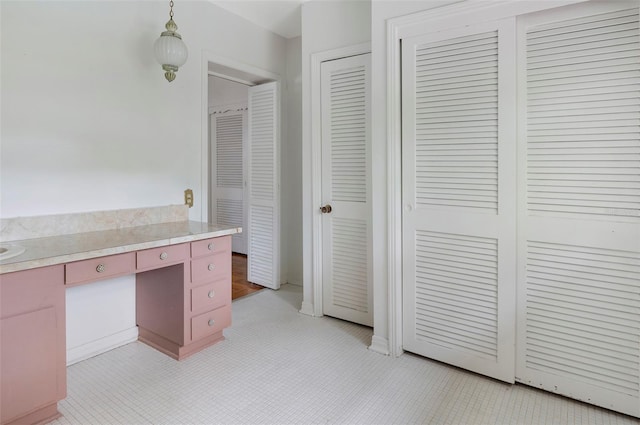 bathroom featuring vanity and tile patterned flooring