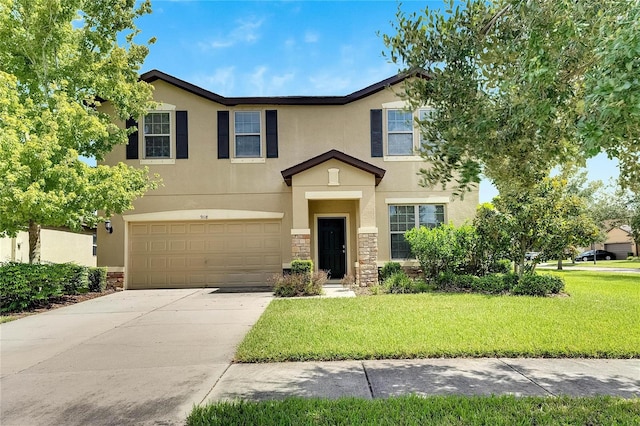 view of front of house featuring a garage and a front yard