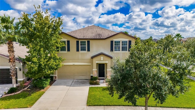 view of front of home with a garage