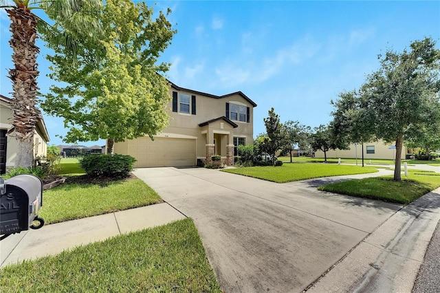 view of front property featuring a garage and a front lawn