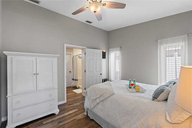 bedroom with dark hardwood / wood-style flooring, multiple windows, and ceiling fan