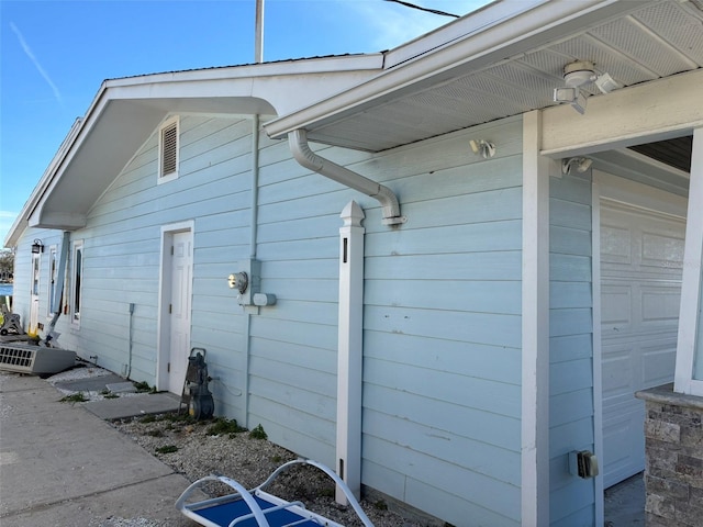 view of home's exterior with a garage