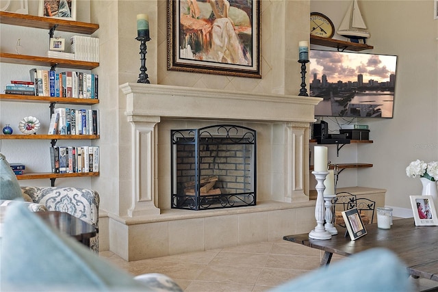 living room featuring tile patterned flooring and a fireplace