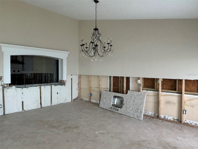 unfurnished dining area featuring an inviting chandelier