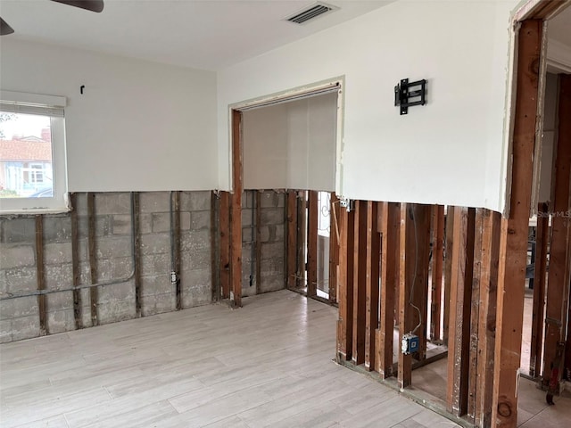 interior space featuring light wood-type flooring and ceiling fan