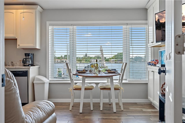 dining area with light hardwood / wood-style floors