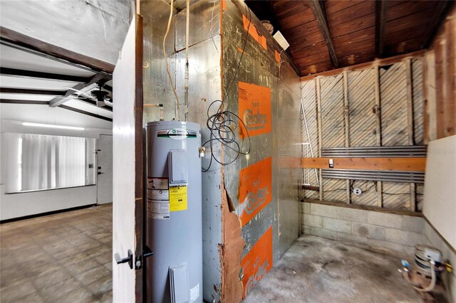 utility room featuring water heater