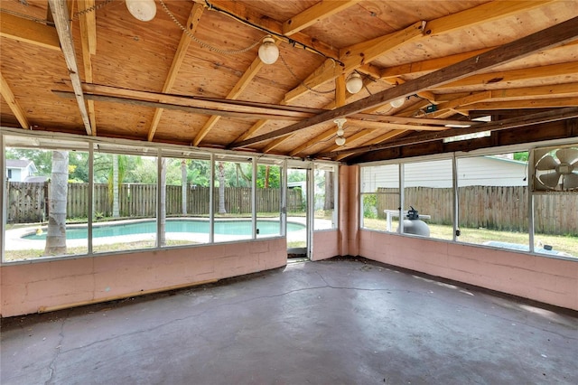 unfurnished sunroom with lofted ceiling