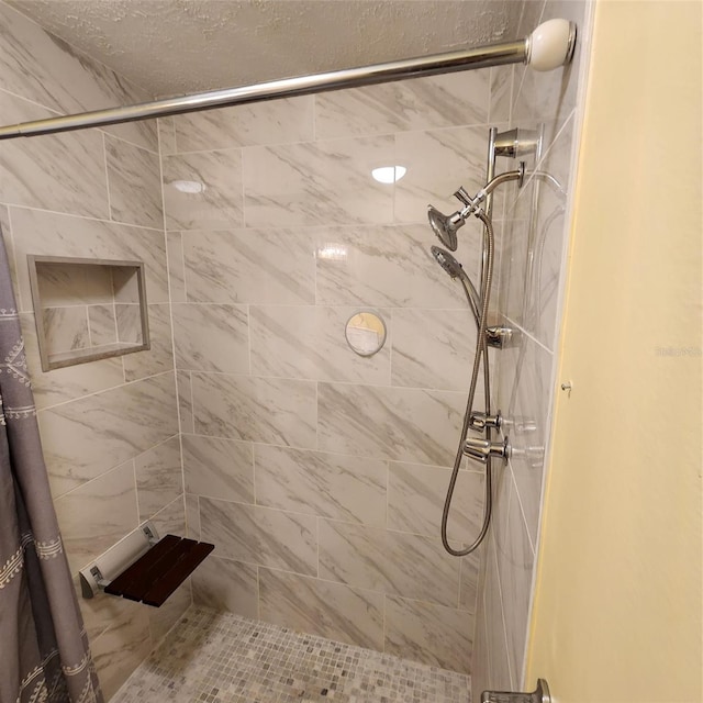 bathroom featuring a shower with curtain