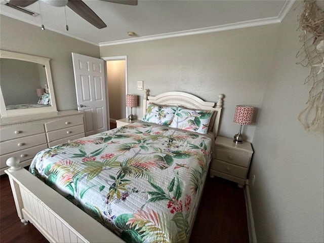 bedroom featuring ceiling fan, crown molding, and dark wood-type flooring