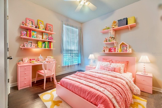 bedroom with dark hardwood / wood-style flooring and ceiling fan