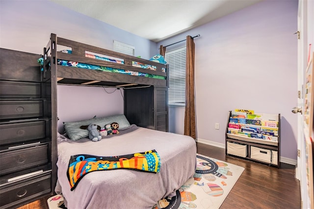 bedroom featuring dark hardwood / wood-style floors