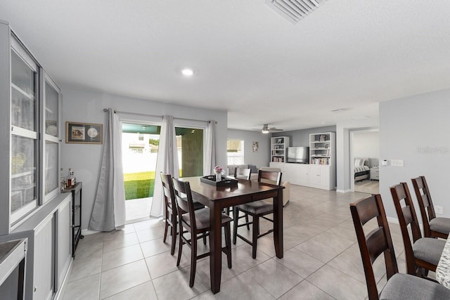684 SE 65th Ter, Ocala, FL 34472 - dining room with light tile patterned floors, a ceiling fan, recessed lighting, and built in features