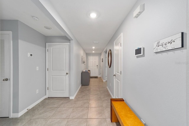 684 SE 65th Ter, Ocala, FL 34472 - corridor with baseboards, light tile patterned floors, and recessed lighting