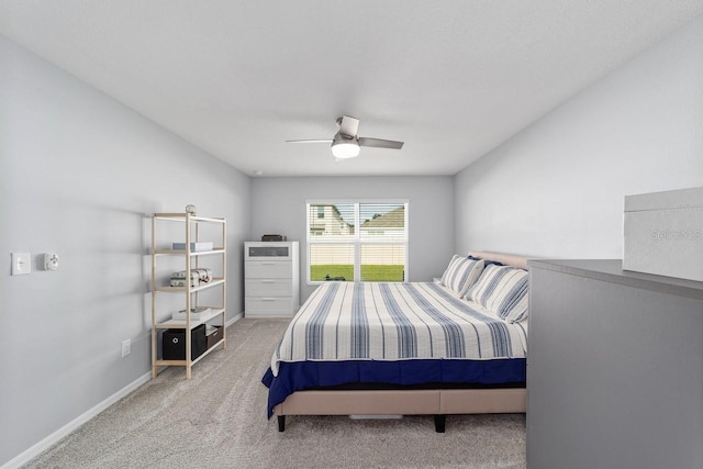 684 SE 65th Ter, Ocala, FL 34472 - bedroom with carpet floors, ceiling fan, and baseboards