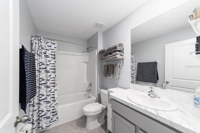 684 SE 65th Ter, Ocala, FL 34472 - bathroom featuring toilet, shower / bathtub combination with curtain, vanity, and tile patterned floors