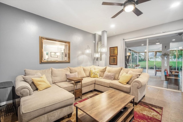 tiled living room with ceiling fan