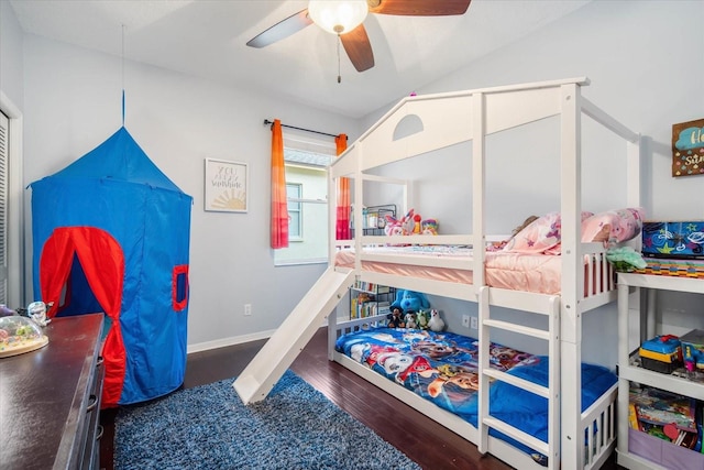 bedroom with ceiling fan and dark hardwood / wood-style flooring